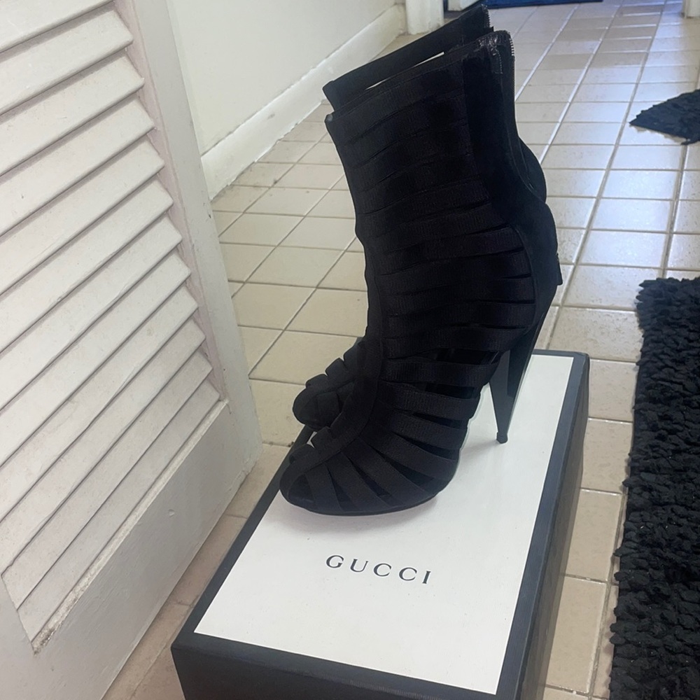 Worn once. Black strap heel